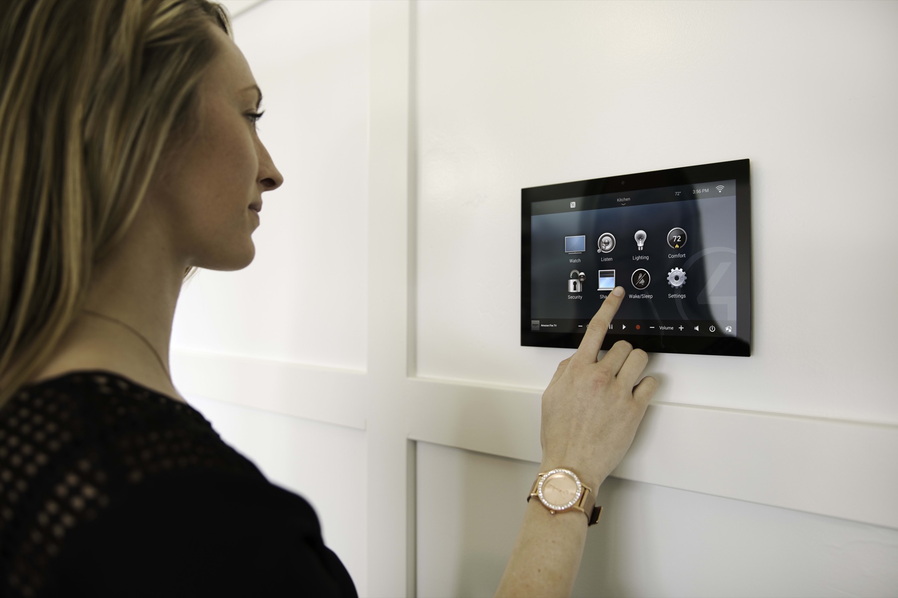 Wall-mounted touchscreen controlling an integrated smart home